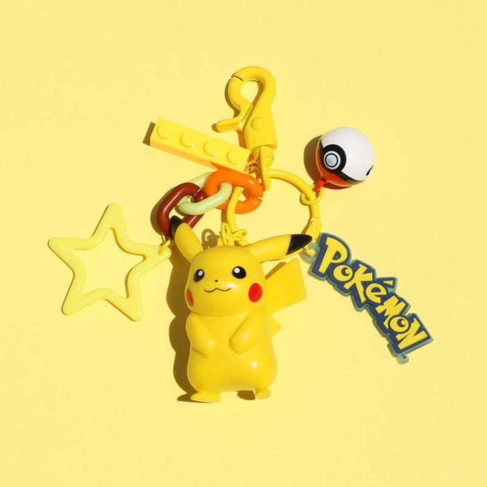 Pokemon Lover Keychain with Accessories: teal, yellow Squirtle-like turtle character, cartoon style