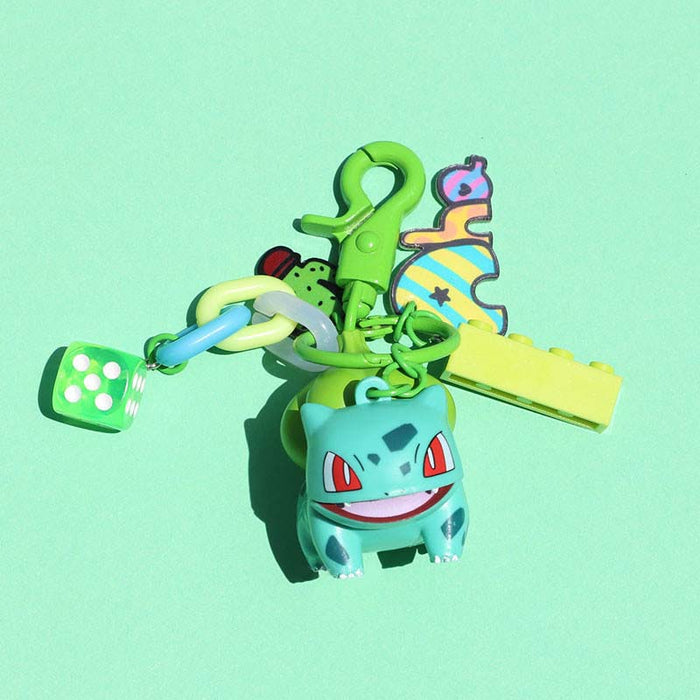 Pokemon Lover Keychain with Accessories: teal, yellow Squirtle-like turtle character, cartoon style
