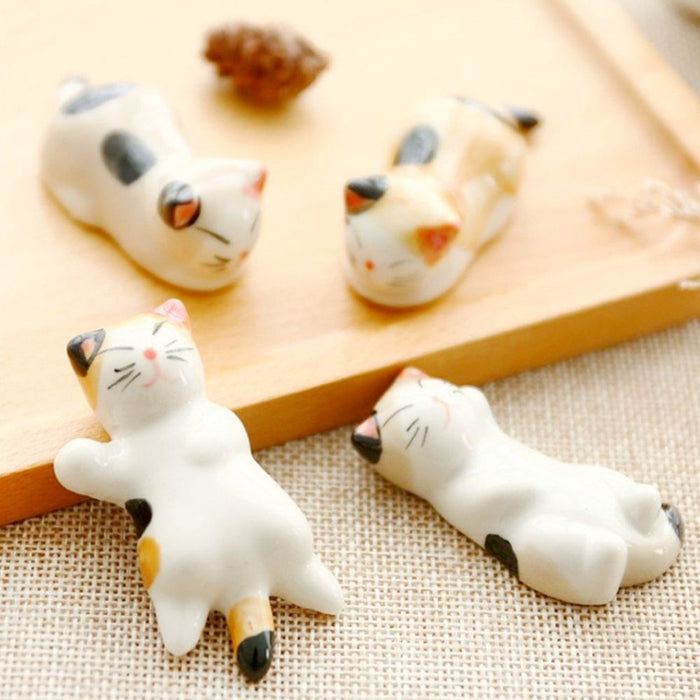 Porcelain Feline Chopstick Rests, Set of Holders: white, black cats, cute cartoon style
