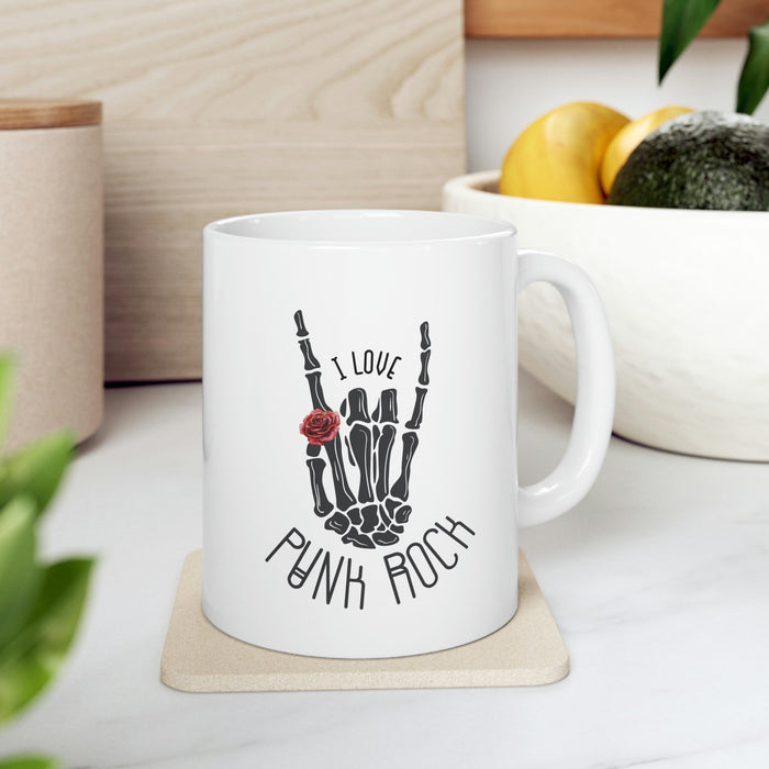 Punk Rock Skeleton Hand Mug: white, black punk rock skeletal hand graphic, punk rock graphic style