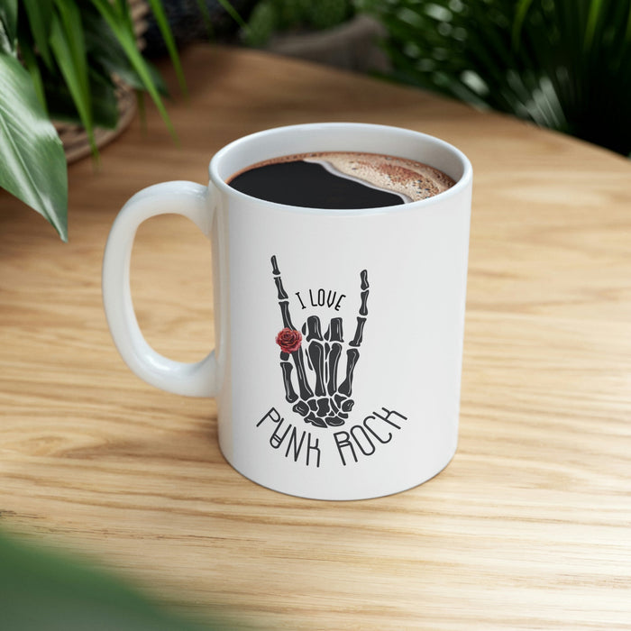Punk Rock Skeleton Hand Mug: white, black punk rock skeletal hand graphic, punk rock graphic style