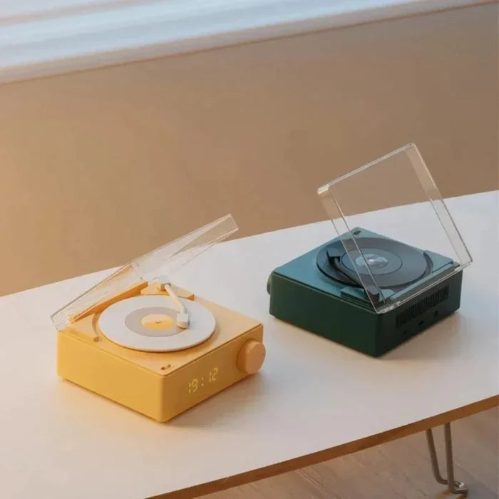 Retro Bluetooth Turntable Speaker with Alarm Clock Functionality: pale yellow, white turntable-style audio player with digita