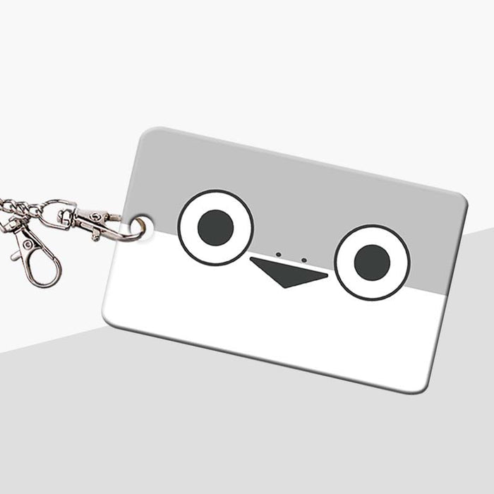 Sacabambaspis Badge Holder with Meme-inspired Design: gray, white cartoon face/character, minimal cartoon style