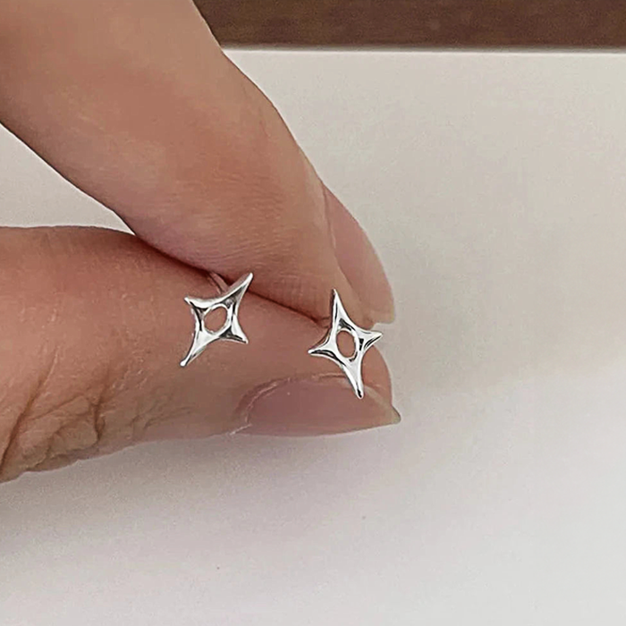 Shiny Star Earrings: silver stud earrings, minimal style