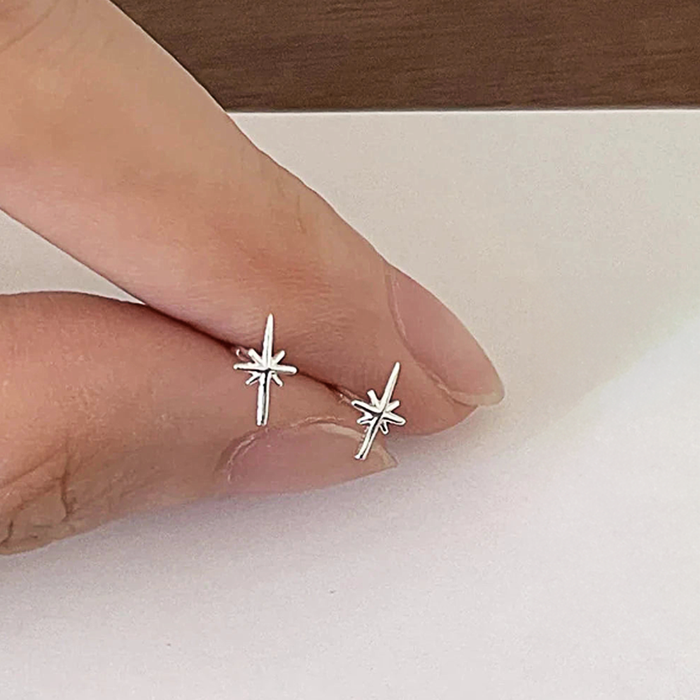 Shiny Star Earrings: silver stud earrings, minimal style