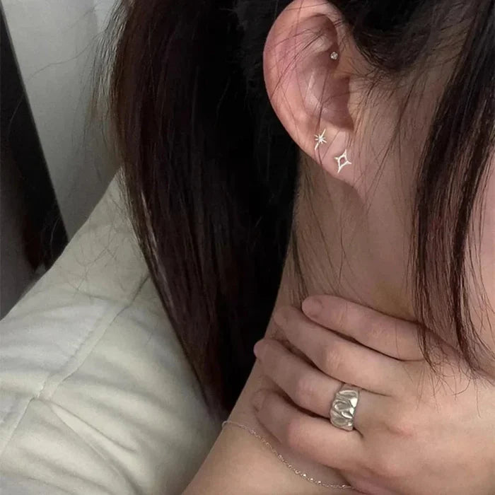Shiny Star Earrings: silver stud earrings, minimal style