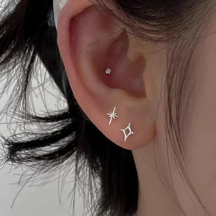 Shiny Star Earrings: silver stud earrings, minimal style