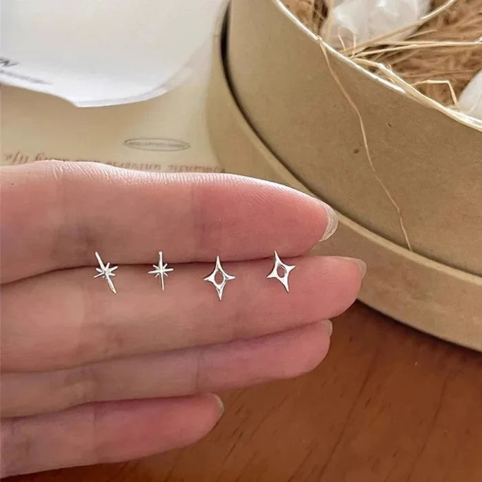 Shiny Star Earrings: silver stud earrings, minimal style