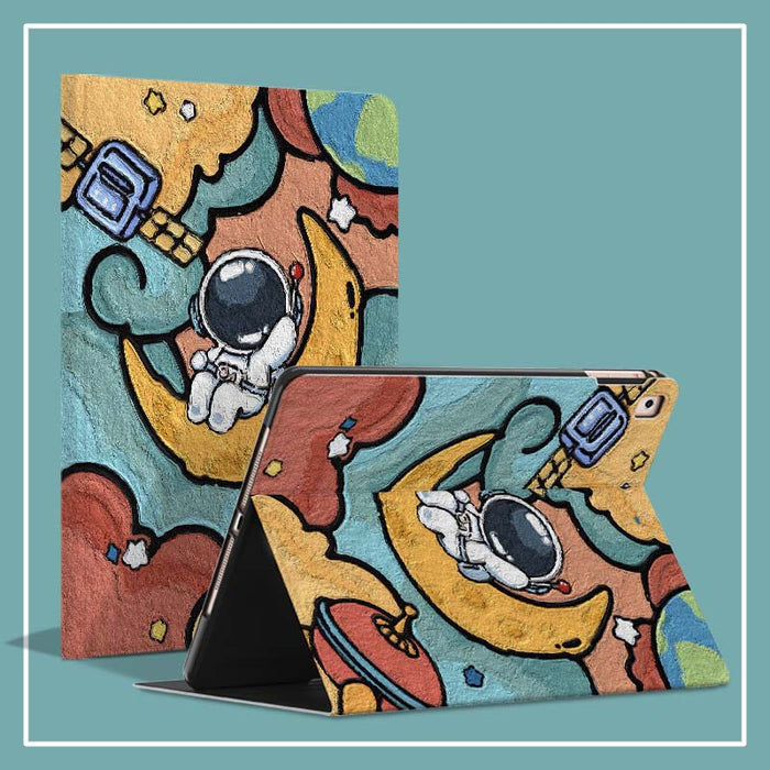 Space Astronaut iPad Mini Cases: teal, yellow cartoon astronaut and space theme, cartoon, colorful, playful style