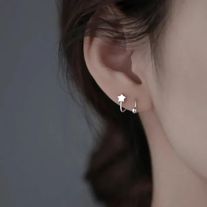 Spiral Earrings with a Delicate Design: silver star, minimal style
