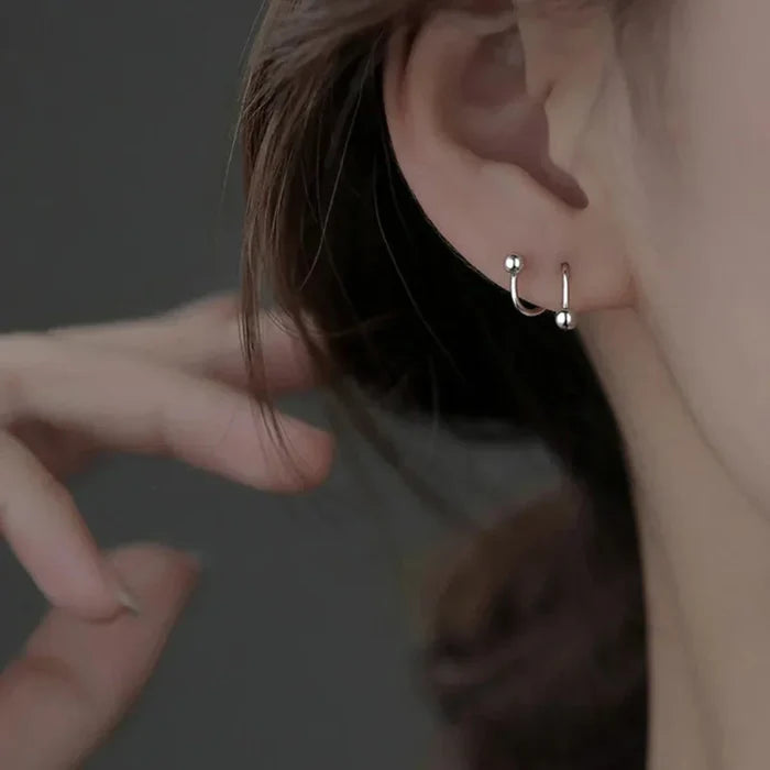 Spiral Earrings with a Delicate Design: silver star, minimal style