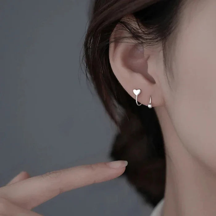 Spiral Earrings with a Delicate Design: silver star, minimal style