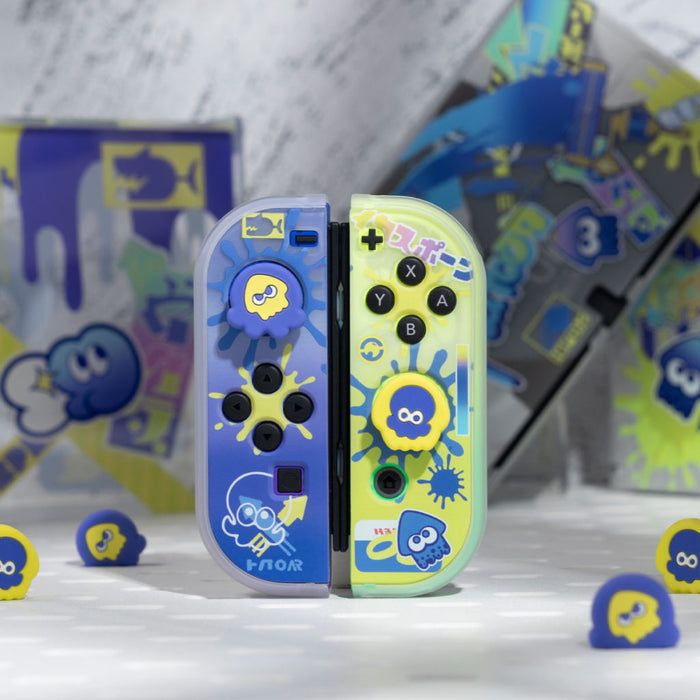 Splatoon 3 Switch OLED Joystick Caps: blue, lime green cartoon squid/octopus-like characters, cartoon, playful, colorful styl