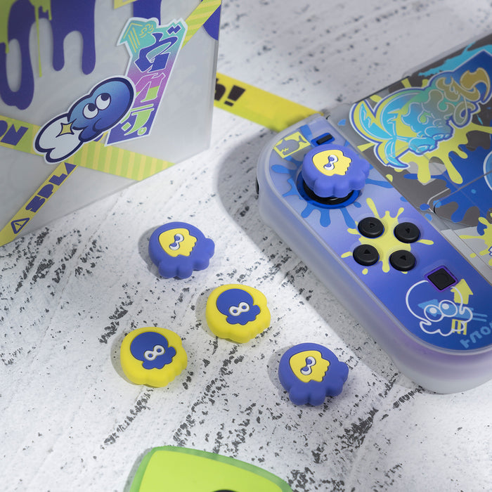 Splatoon 3 Switch OLED Joystick Caps: blue, lime green cartoon squid/octopus-like characters, cartoon, playful, colorful styl