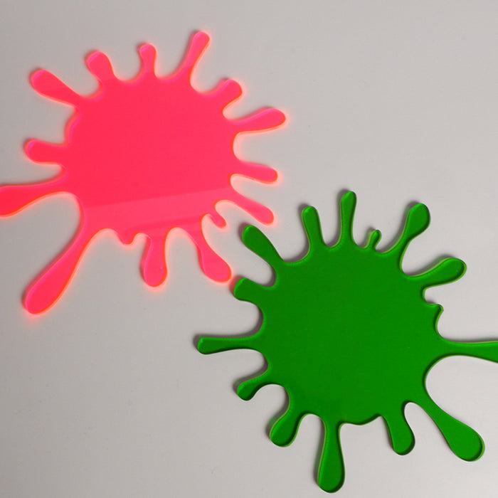 Splatoon Coasters: Stylish, Durable, Playful: blue, yellow splat-shaped decorative objects, cartoon style
