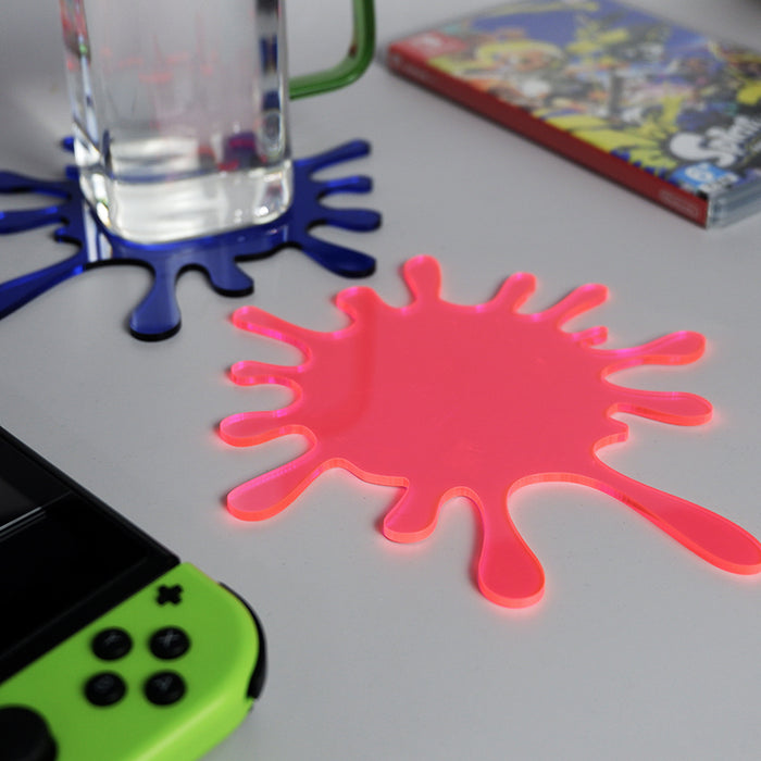 Splatoon Coasters: Stylish, Durable, Playful: blue, yellow splat-shaped decorative objects, cartoon style