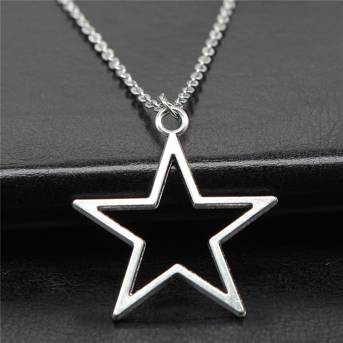 Star-Shaped Open Pendant Necklace: silver star, minimal style