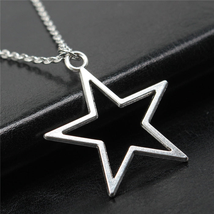 Star-Shaped Open Pendant Necklace: silver star, minimal style