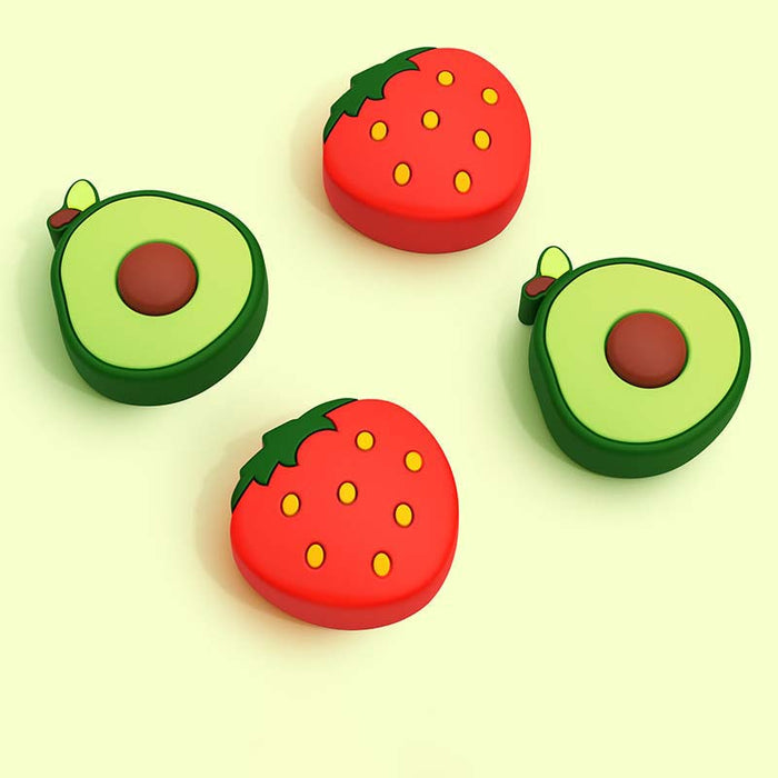 Strawberry x Avocado Switch Thumb Grips: red, green strawberries and avocado halves, cartoon, kawaii style