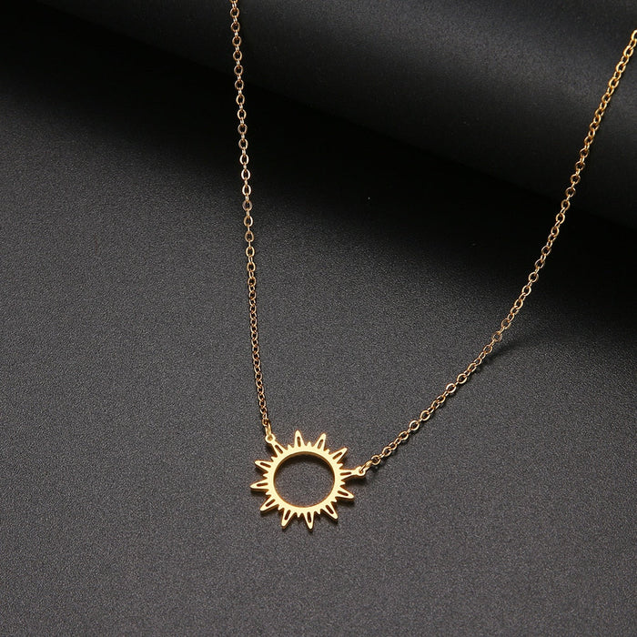 Sunlit Pendant Necklace: gold, black sun, minimal style