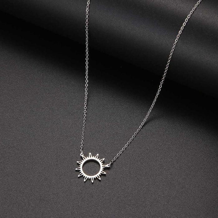 Sunlit Pendant Necklace: gold, black sun, minimal style