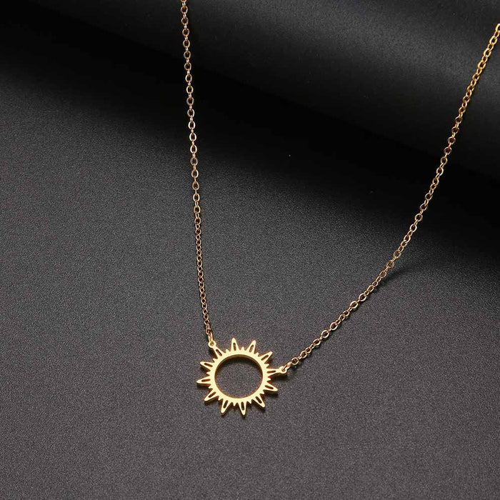 Sunlit Pendant Necklace: gold, black sun, minimal style