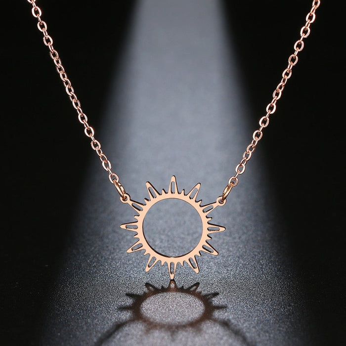 Sunlit Pendant Necklace: gold, black sun, minimal style