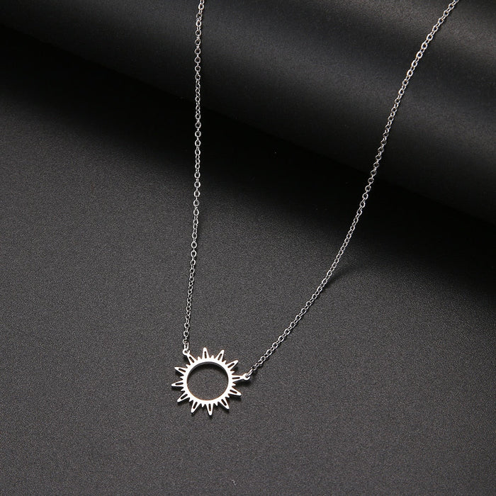 Sunlit Pendant Necklace: gold, black sun, minimal style