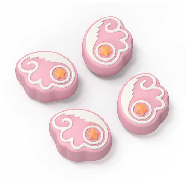 Switch Thumb Grips with Angel Wings: pink, white stylized winged emblem with star, kawaii cartoon style