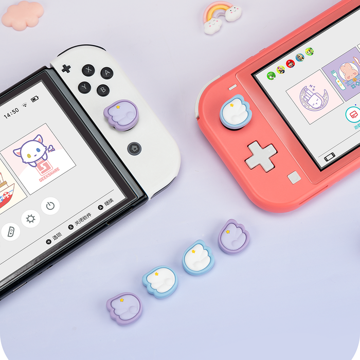 Switch Thumb Grips with Angel Wings: pink, white stylized winged emblem with star, kawaii cartoon style