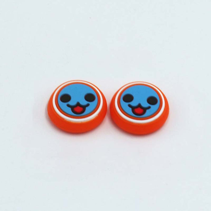 Taiko-inspired Joystick Caps for Gaming Controllers: light green, white smiling cartoon face, kawaii cartoon style