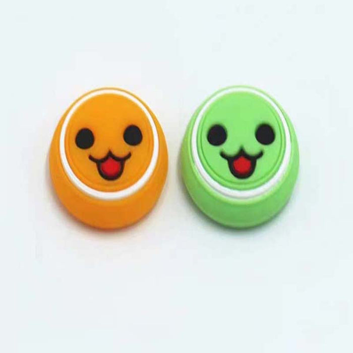 Taiko-inspired Joystick Caps for Gaming Controllers: light green, white smiling cartoon face, kawaii cartoon style
