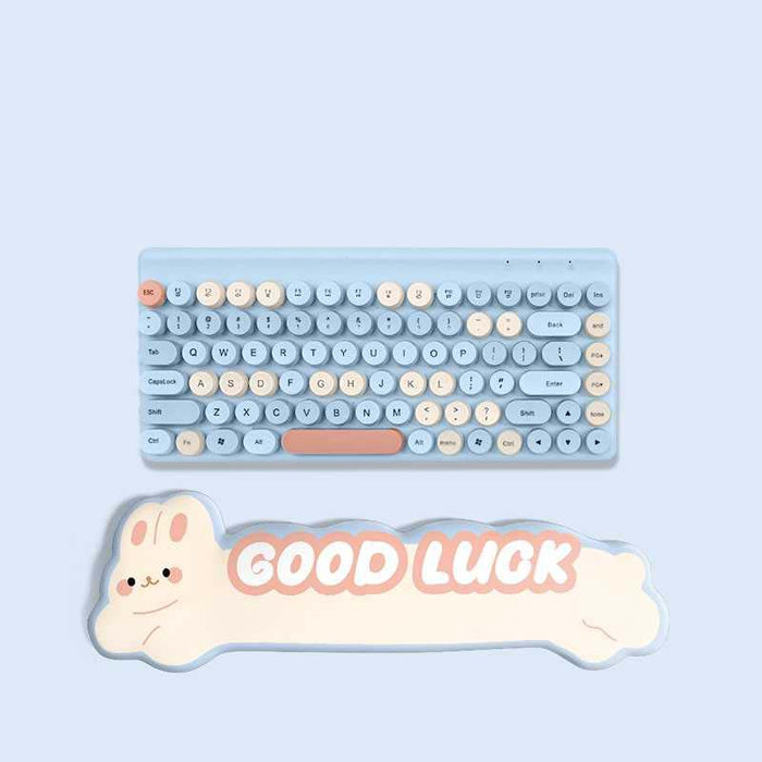 The Rabbit Keyboard Wrist Rest & Mousepad: light blue, white cute white rabbit character, kawaii cartoon style