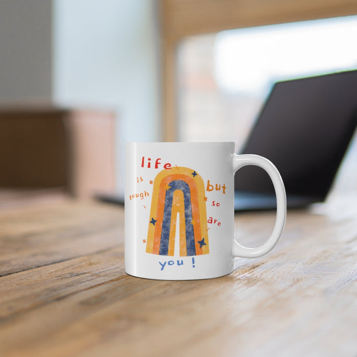 Tough as Life, Strong as You Coffee Tea Mug: white, orange motivational text and abstract rainbow graphic, colorful hand-draw