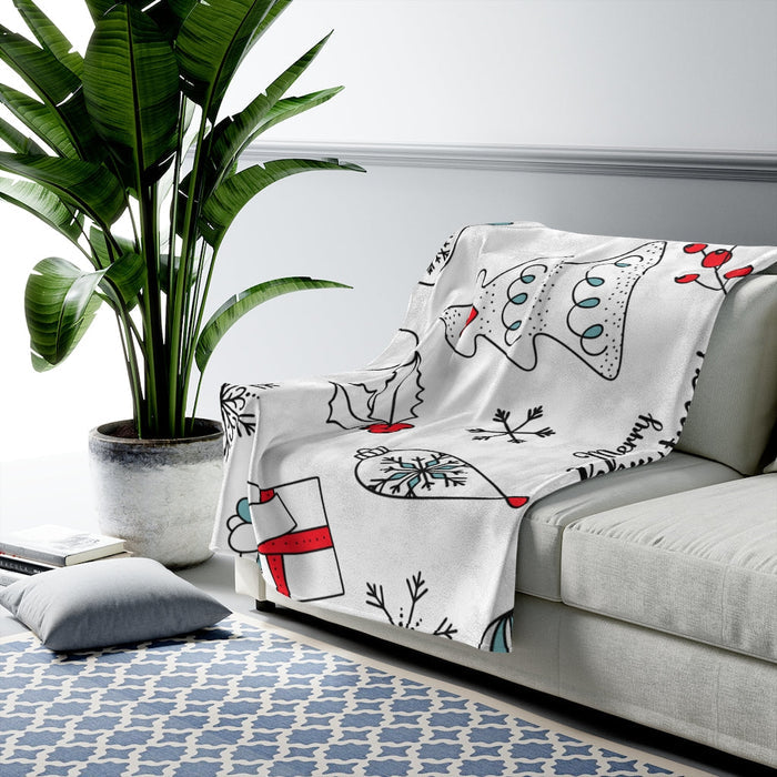 Velveteen Plush Blanket with a Festive Holiday Design: white, black festive holiday doodles including snowmen, ornaments, sno