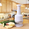 Versatile Vegetable Cutter with Multiple Functions: red, clear manual food chopper, minimal kitchen tool style