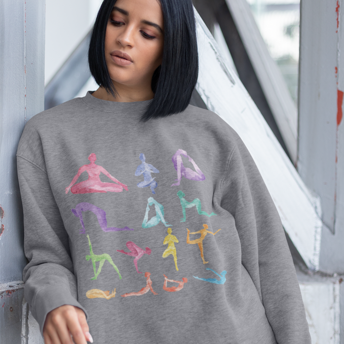 Yoga-Inspired Pullover Sweatshirt: off-white, multicolor graphic yoga/meditation figures, casual graphic style