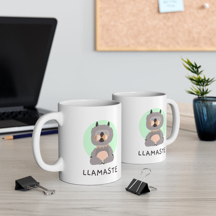 Yoga Mug with LLAMASTE Design: white, gray cartoon llama, cute cartoon style