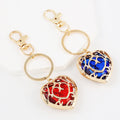 Zelda Heart Container Keychains and Necklace: gold, red heart motif, ornate decorative style