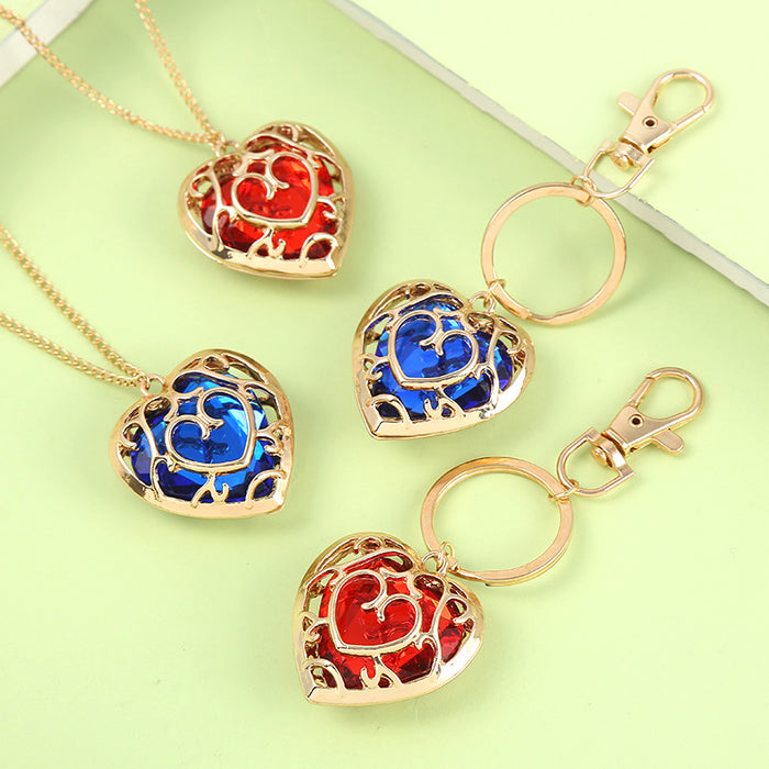 Zelda Heart Container Keychains and Necklace: gold, red heart motif, ornate decorative style