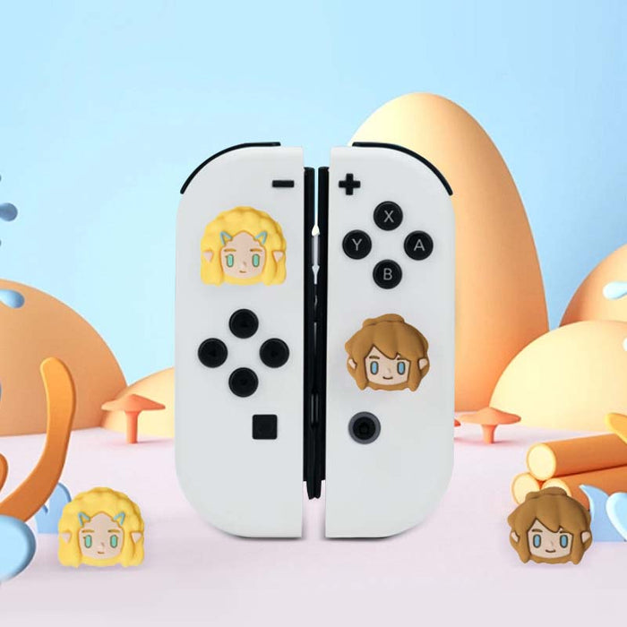 Zelda Joystick Caps for Gaming Controllers: white, black cartoon blonde and brown-haired character faces, kawaii cartoon styl