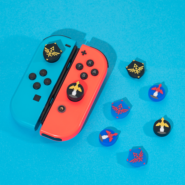 Zelda Thumb Grips: Enhance Gaming Experience: dark gray, black fantasy sword and winged crest emblem, fantasy game-inspired g